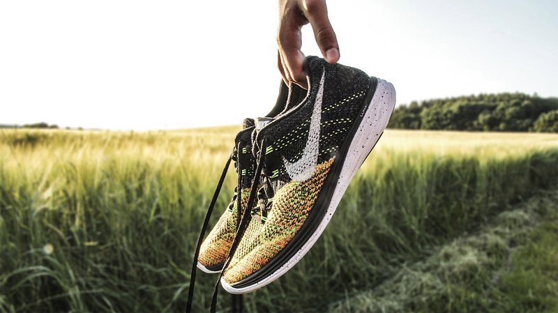 Elevate Your Look With Women'S Black And Gold Nike Shoes