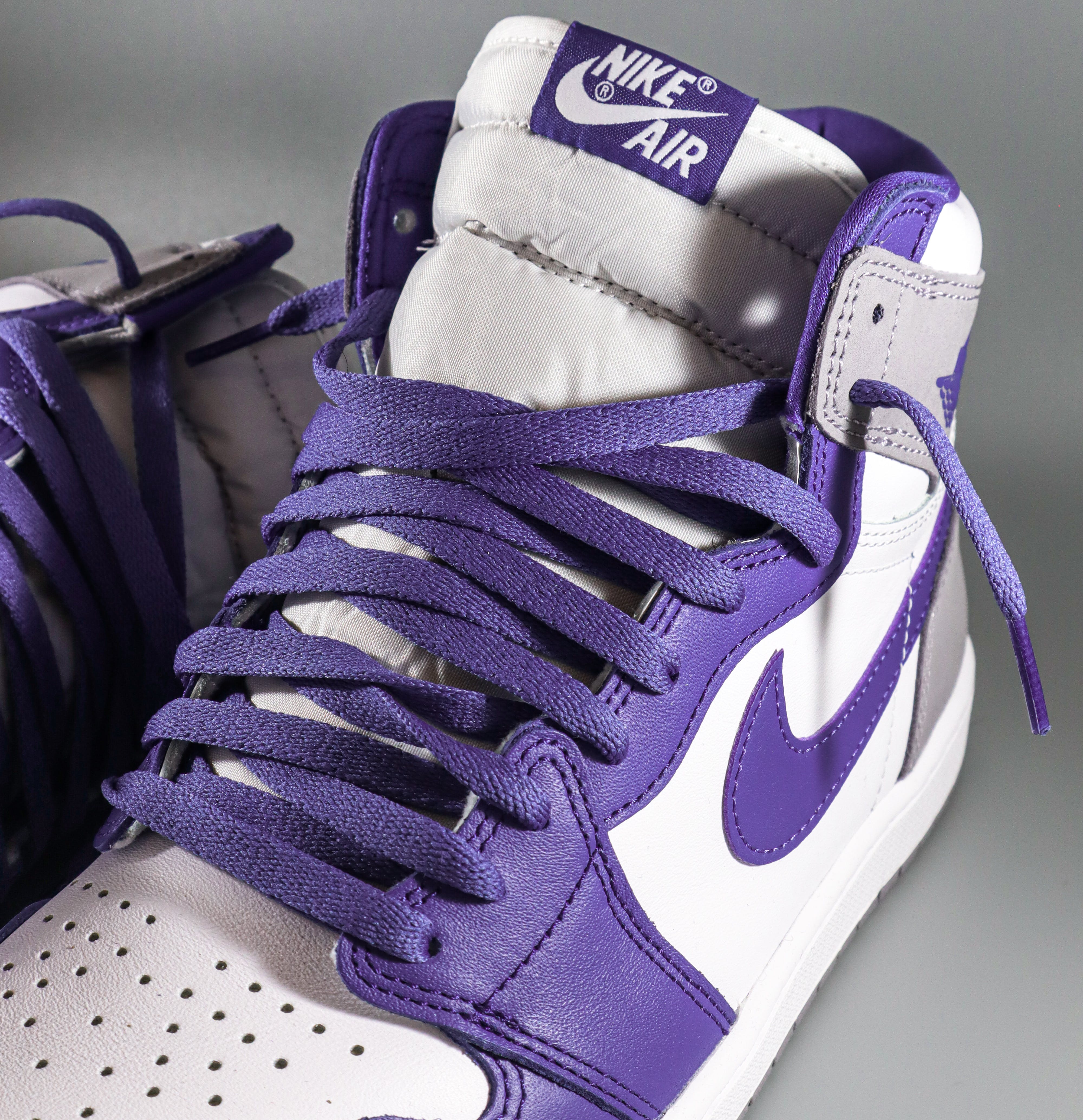 Step Up Your Style With Purple And White Nike Shoes