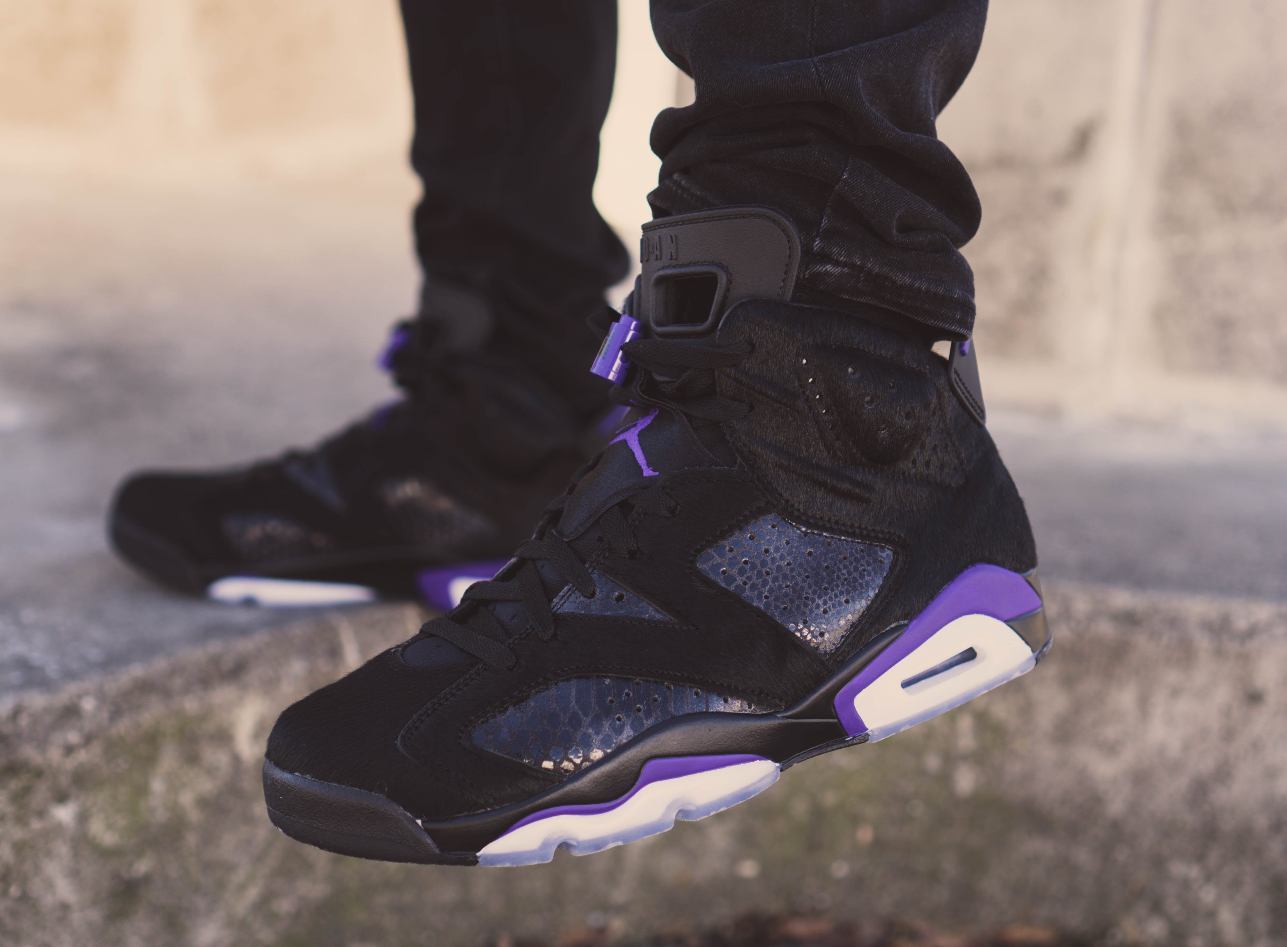 Add Some Edge To Your Look With Purple And Black Nike Shoes