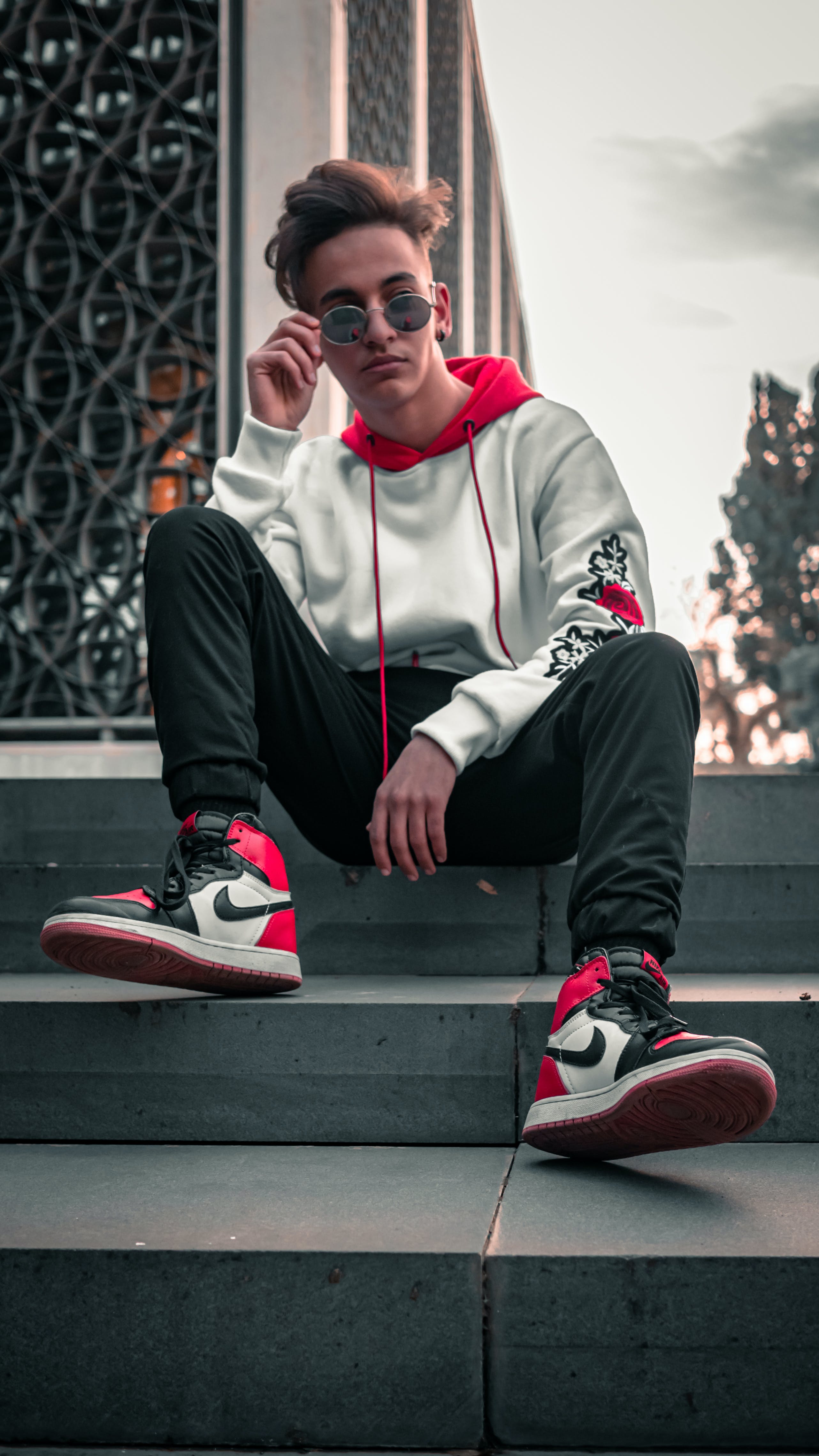 Add Edge To Your Look With Nike Jordans Red And Black